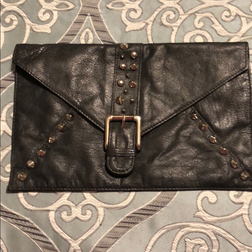 Black studded clutch